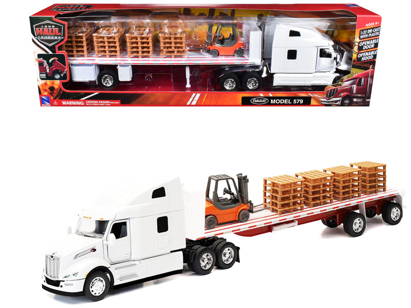 Peterbilt 579 Truck White with Flatbed Trailer White and Load of Forklift and Pallets Long Haul Truckers Series 1/32 Diecast Model New Ray 12573