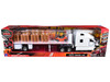 Peterbilt 579 Truck White with Flatbed Trailer White and Load of Forklift and Pallets Long Haul Truckers Series 1/32 Diecast Model New Ray 12573