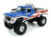 1979 Ford F-250 Monster Truck Bigfoot USA 250 Tribute Blue with USA Flag Graphics and Bob Chandler Standing Figure Kings of Crunch Series 1/18 Diecast Model Car Greenlight 13726