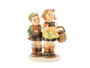 M.I. Hummel figurine HUM 49/0 To Market featuring a young brother and sister carrying a wicker basket on their way to the village market, handcrafted in Germany.