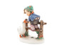 M.I. Hummel 'Barnyard Hero' figurine (HUM 195) featuring a boy sitting on a fence while a white goose honks at him.