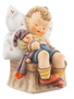 M.I. Hummel 'Just Dozing' (HUM 451) showing a boy asleep in a chair holding a doll.
A close-up of the boy's peaceful facial expression and the hand-painted details of the wooden-style chair.
