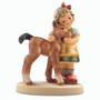 M.I. Hummel 'Precious Pony' figurine HUM 2310 featuring a young girl hugging a small pony, nuzzling her chin. Close-up of the delicate hand-painted features and TMK-9 trademark on the Precious Pony porcelain collectible.