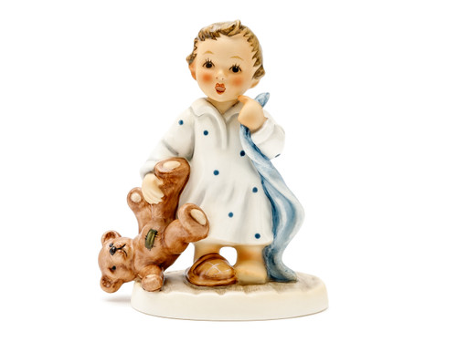 M.I. Hummel 'No Bed Please' (HUM 2313) showing a boy in pajamas with a blanket, teddy bear, and one bare foot.
 A close-up of the "missing slipper" and the determined expression on the boy's face.