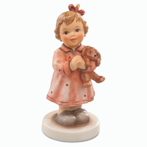 M.I. Hummel 'A Prayer For You' (HUM 2318/A) showing a girl in red pajamas holding a brown teddy bear. A close-up of the girl's prayerful face and the "red-polka-dot" pajama pattern.