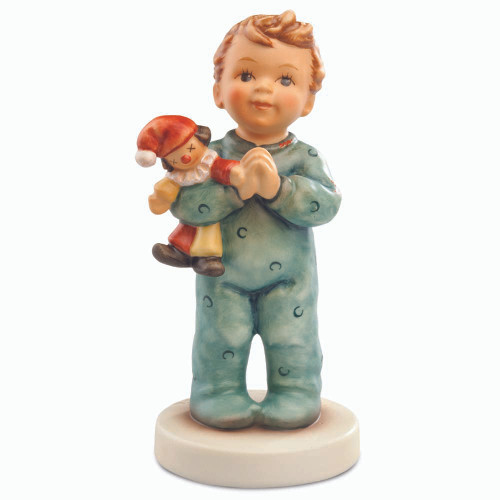 M.I. Hummel's "A Prayer For Everyone' (HUM 2318/B) features a boy in blue pajamas holding a clown doll.  Close-up of the boy's prayerful expression and the colorful details of his clown doll.