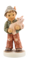 M.I. Hummel 'Prized Pig' figurine (HUM 2325) showing a young boy in overalls holding up a small pink pig.  A close-up of the boy’s proud expression and the 2011 TMK-9 backstamp on the base of the Prized Pig figurine.