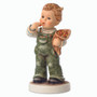 M.I. Hummel figurine HUM 2341 "Candy Cutie" featuring a boy with a traditional German candy cone.