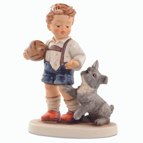 M.I. Hummel figurine HUM 2346 "It's My Turn" featuring a boy playing soccer with his dog