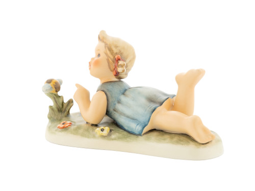 Miss Beehaving Hum 2105 M.I. Hummel Club 10th Anniversary exclusive figurine of a girl with a bee.