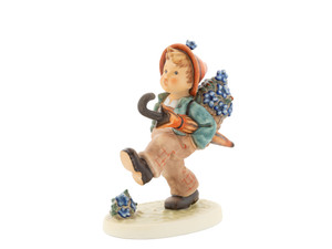 M.I. Hummel Club Exclusive figurine HUM 79/I Globe Trotter featuring a boy traveling with an umbrella and a basket of grapes, 35th Anniversary edition.