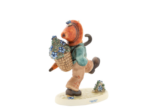 Globe Trotter Hum 79/I M.I. Hummel Club 35th Anniversary exclusive figurine with enhanced 24-color palette.