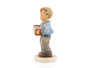 Focus on the "eyes-closed" devoted expression and the formal bow tie of the Making Music figurine.