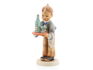 M.I. Hummel figurine HUM 154/I Waiter featuring a young boy dressed in a formal jacket and bowtie, ready to serve, handcrafted in Germany.