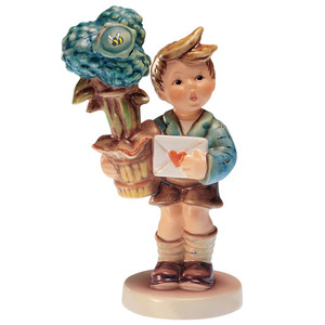M.I. Hummel figurine HUM 539 "Good News" featuring a boy delivering a letter sealed with a heart.