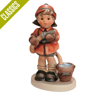 M.I. Hummel's 'Fire Fighter' (HUM 2030) features a young boy in a red fire jacket and black helmet holding a coiled fire hose.