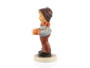 M.I. Hummel 'For Me?' figurine (HUM 2067/B) showing a boy in a red scarf holding a gold gift box.