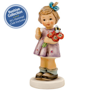 Honey Blossom HUM 2369 M.I. Hummel 2015/2016 Club Exclusive figurine of a girl with flowers. Close-up of the bright, hand-painted flower bouquet held by the M.I. Hummel Honey Blossom figurine.