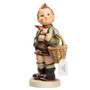 M.I. Hummel Final Issue figurine HUM 51 "Village Boy" featuring a boy with a basket on a cobblestone base.