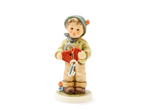 Key to My Heart HUM 2363 M.I. Hummel Swarovski series figurine of a boy with a crystal key.