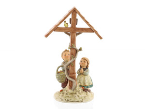Children’s Prayer HUM 448 M.I. Hummel figurine of a boy and girl praying at a Bavarian roadside shrine.