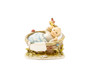 M.I. Hummel 'Wake up Boy!' figurine (HUM 656) showing a baby boy in a basket with a blue blanket and a yellow bird