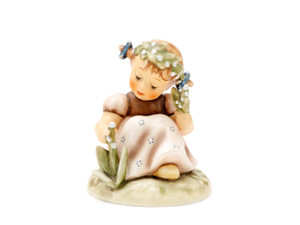M.I. Hummel 'Garden Splendor' figurine HUM 835 featuring a girl with a floral crown holding a bouquet