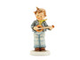 M.I. Hummel's 'The Little Troubadour' figurine HUM 558, featuring a boy standing and playing a lute.