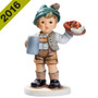 M.I. Hummel Bavarian Good Cheer HUM 2374 porcelain figurine of a boy in traditional lederhosen carrying a beer stein and food basket.