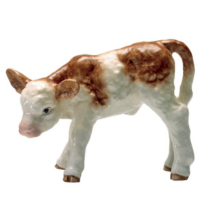 M.I. Hummel Nativity figurine HUM 2230/M featuring a young brown calf resting, handcrafted in Germany for the stable set.