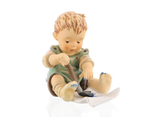 M.I. Hummel Baby’s First Drawing HUM 2201 porcelain toddler figurine, perfect for a nursery or baby collection
