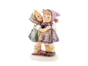 M.I. Hummel figurine HUM 196/0 Telling Her Secret, featuring two young girls whispering and sharing a secret, handcrafted in Germany.