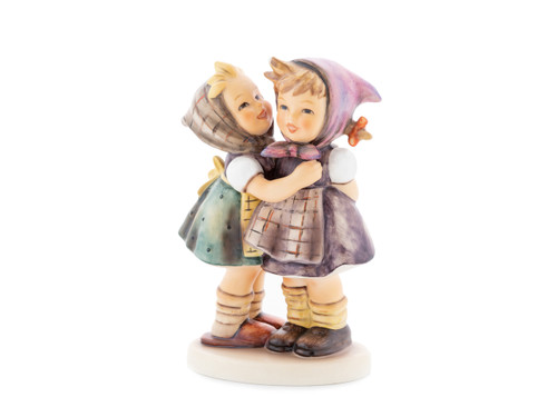 M.I. Hummel figurine HUM 196/0 Telling Her Secret, featuring two young girls whispering and sharing a secret, handcrafted in Germany.