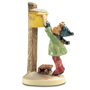 Letter to Santa Claus HUM 340 M.I. Hummel figurine of a boy putting a letter in a mailbox next to a sled. Close-up of the boy on tiptoe from the M.I. Hummel Letter to Santa Claus figurine.