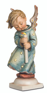 Close-up of the detailed hand-painted wings on the M.I. Hummel Masterpiece Heavenly Angel. Masterpiece Heavenly Angel HUM 21/III M.I. Hummel large-scale figurine with candle.