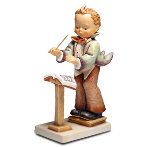 The large-scale M.I. Hummel 'Band Leader' figurine HUM 129/III featuring a boy conductor on a podium.