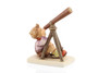 Detail of the telescope and the boy's inquisitive expression on the Star Gazer Hummel collectible.