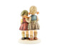 Detail of the hand-painted traditional Bavarian clothing and the musical instrument on the Close Harmony collectible.