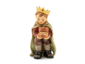 Close-up of the shimmering gold within the treasure chest held by the M.I. Hummel Melchior figurine.  King Melchior HUM 2230/G M.I. Hummel Nativity figurine standing with a green cloak and treasure chest.
