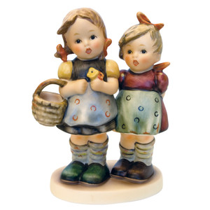 M.I. Hummel 'Daddy’s Girls' (HUM 371) featuring two sisters in red ribbons and dirndls carrying a basket. Close-up of the intricate basket weave and the matching red hair ribbons of the sisters.