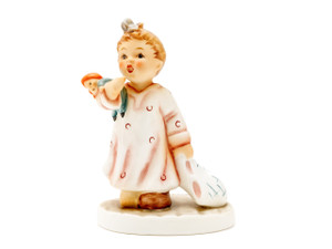 M.I. Hummel Bedtime Story Please HUM 2383 figurine of two children in pajamas holding books.