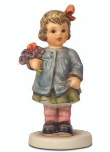 M.I. Hummel Gift of Hope HUM 2377 figurine from the Hope Series featuring a girl with yellow flowers for breast cancer awareness.