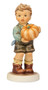 M.I. Hummel's 'Sweet Bounty' (HUM 2382) Club Exclusive featuring a young boy in lederhosen carrying a large, hand-painted orange pumpkin.