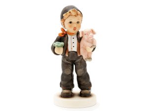 M.I. Hummel figurine HUM 2375 Feelin' Lucky featuring a chimney sweep holding a lucky pig and a shamrock, handcrafted in Germany with intricate 3D shading.