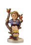 M.I. Hummel 'Apple Tree Boy' figurine HUM 142 4/0 featuring a boy sitting in the branches of an apple tree.