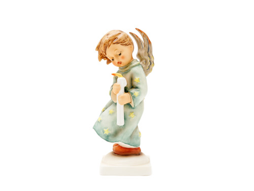 Heavenly Angel HUM 21 M.I. Hummel angel figurine holding a golden lantern.