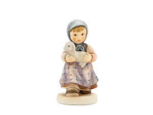 M.I. Hummel 'My Little Lamb' figurine (HUM 661) featuring a girl in a headscarf and dirndl cradling a white lamb.