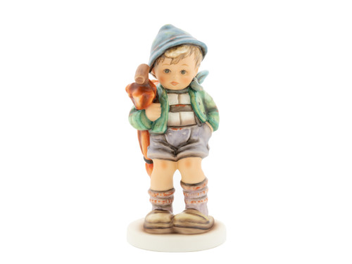 M.I. Hummel Good Luck HUM 419/I porcelain figurine of a boy with green eyes,  green lederhosen, and an umbrella