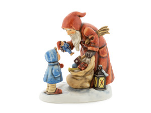 St. Nicholas Day HUM 2012 Limited Edition M.I. HUMMEL figurine with Santa and boy.