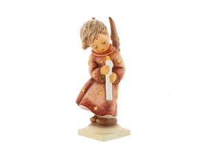 M.I. Hummel figurine HUM 21/III Heavenly Angel wearing a festive red robe and holding a candle, large-scale Christmas edition handcrafted in Germany.